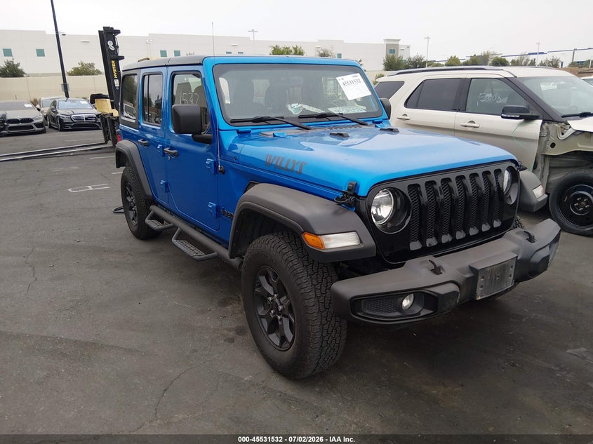 2023 Jeep Wrangler / VIN 1C4HJXDG1PW531165 — IAAI salvage auction photo