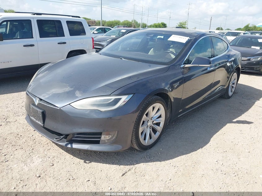 2016 Tesla Model s VIN 5YJSA1E15GF144359 IAAI salvage auction — LEFT SIDE, Original (Texas), sold $4,250 on 2026-07-13 (photo 2)