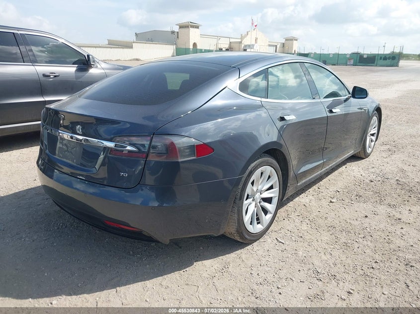 2016 Tesla Model s VIN 5YJSA1E15GF144359 IAAI salvage auction — LEFT SIDE, Original (Texas), sold $4,250 on 2026-07-13 (photo 4)