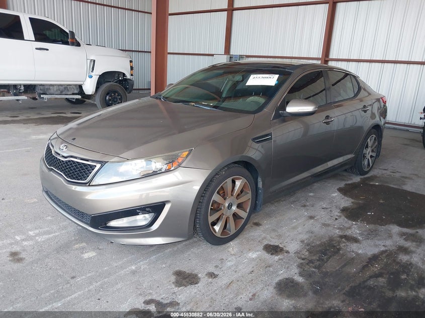 2013 Kia Optima VIN 5XXGR4A61DG104659 IAAI salvage auction — NORMAL WEAR, Clear (Florida), sold $700 on 2026-07-15 (photo 2)