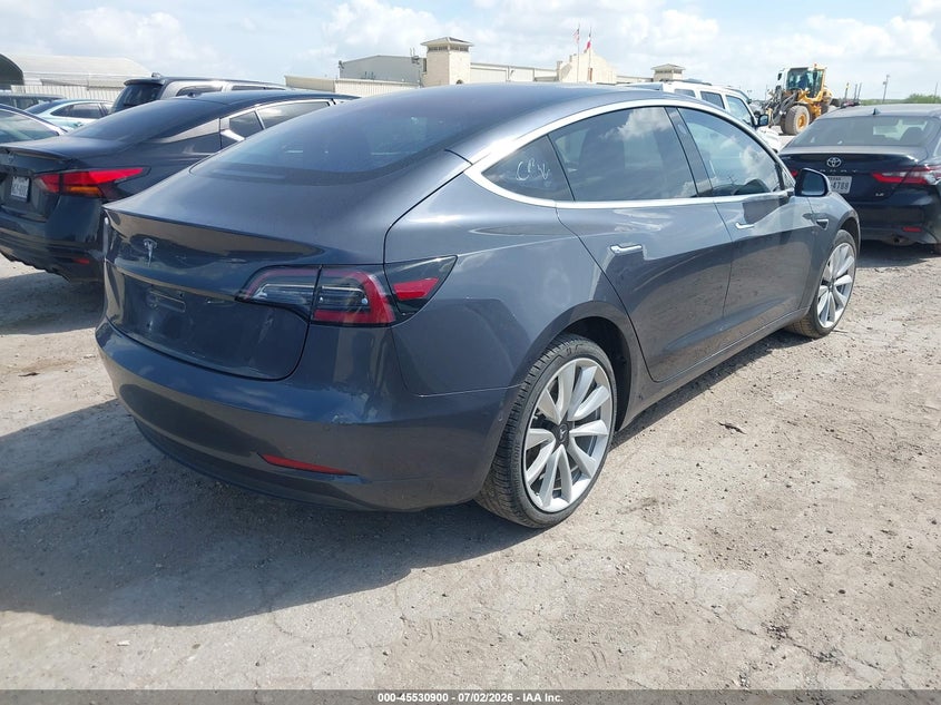 2018 Tesla Model 3 VIN 5YJ3E1EA7JF009562 IAAI salvage auction — HAIL, Original (Texas), sold $5,350 on 2026-07-27 (photo 4)