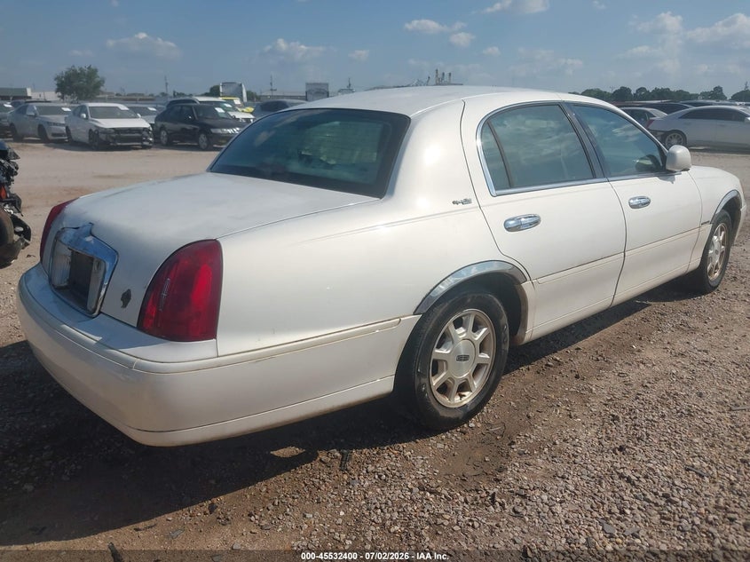 2002 Lincoln TOWN CAR VIN 1LNHM82W22Y650178 IAAI salvage auction — NORMAL WEAR, Clear (Alabama), sold $25 on 2026-07-28 (photo 4)