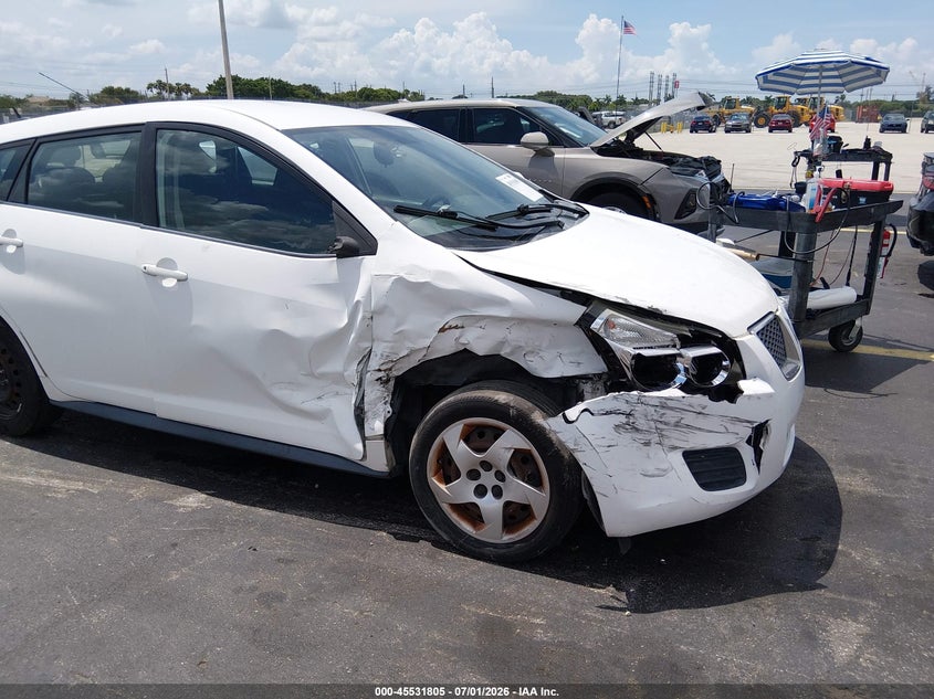 2010 Pontiac Vibe VIN 5Y2SP6E8XAZ415586 IAAI salvage auction — SIDE, Rebuildable (Florida), sold $600 on 2026-07-30 (photo 6)