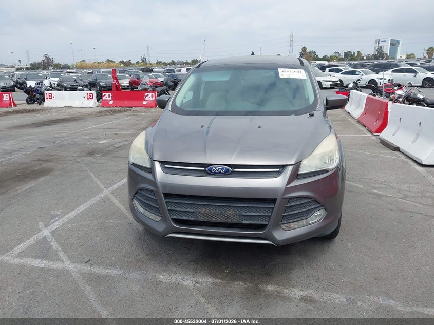 2014 Ford Escape VIN 1FMCU0GXXEUC61703 IAAI salvage auction — NORMAL WEAR, Clear - Dealer Only (California), sold $300 on 2026-07-09 (photo 6)