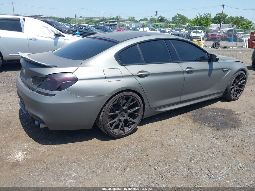 2014 BMW M6 gran coupe VIN WBS6C9C56EDV73877 IAAI salvage auction — LEFT SIDE, Clear (New Jersey), sold $7,100 on 2026-07-13 (photo 4)