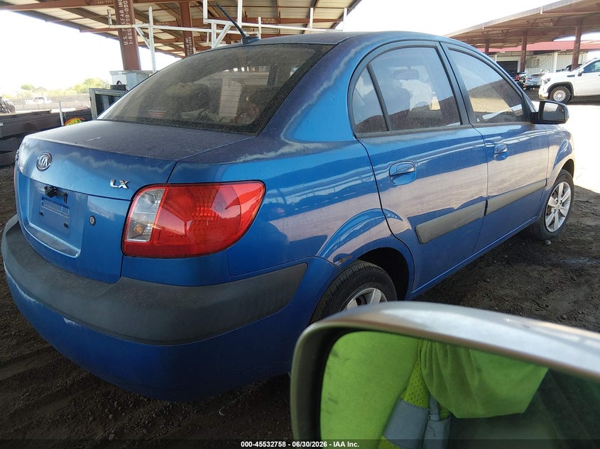 2009 Kia Rio VIN KNADE223896467325 IAAI salvage auction — NORMAL WEAR, Clear-Dealer Only (Arizona), sold $300 on 2026-07-28 (photo 4)