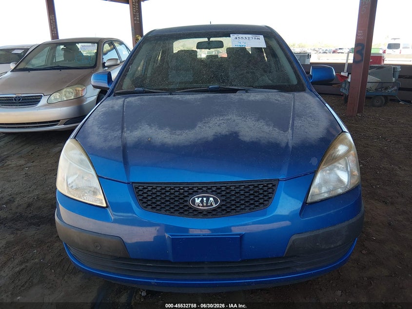 2009 Kia Rio VIN KNADE223896467325 IAAI salvage auction — NORMAL WEAR, Clear-Dealer Only (Arizona), sold $300 on 2026-07-28 (photo 6)