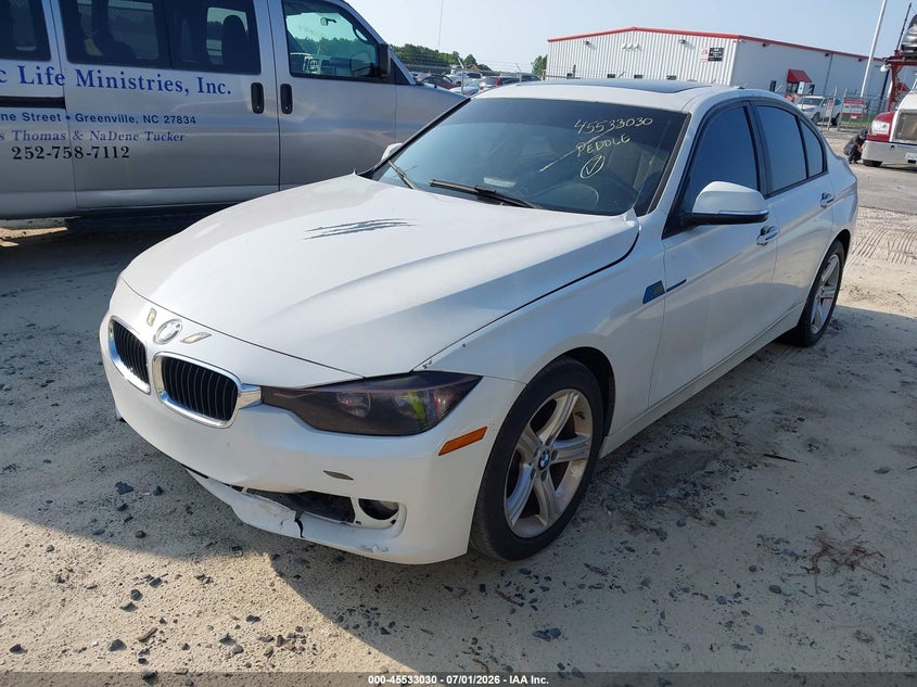 2013 BMW 3er VIN WBA3A5C51DF600394 IAAI salvage auction — NORMAL WEAR, Clear (North Carolina), sold $450 on 2026-07-15 (photo 2)