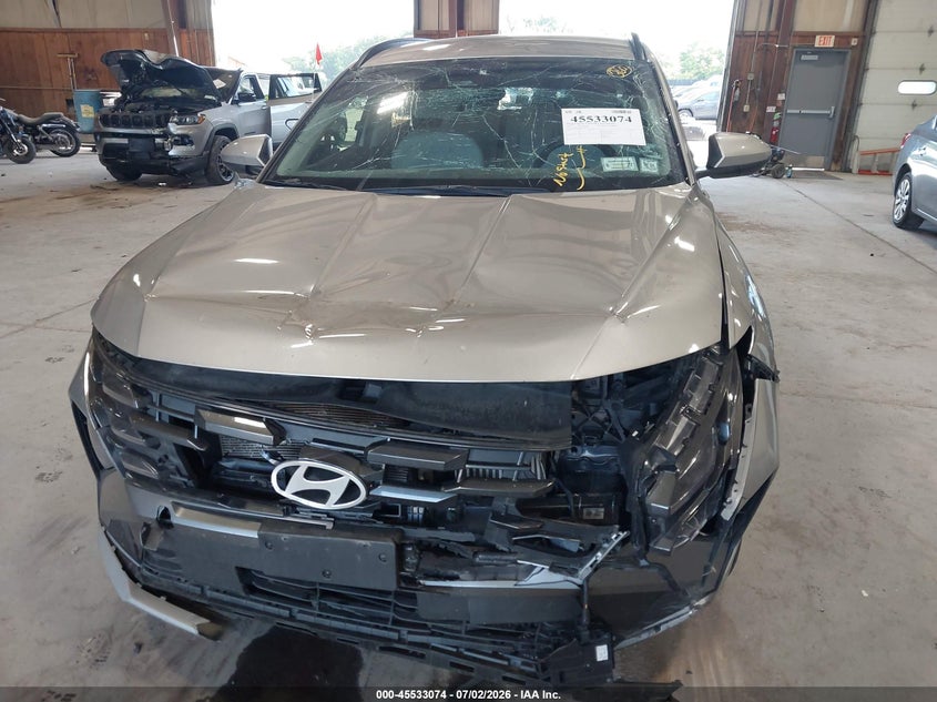 2025 Hyundai Tucson VIN KM8JBDD10SU260107 IAAI salvage auction — FRONT END, Salvage Title, sold $9,300 on 2026-08-22 (photo 6)