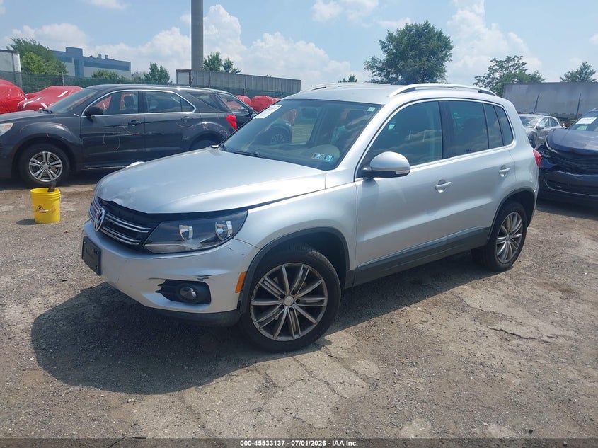 2014 Volkswagen Tiguan VIN WVGBV3AX0EW573763 IAAI salvage auction — RIGHT FRONT, Salvage Title, sold $725 on 2026-08-19 (photo 2)