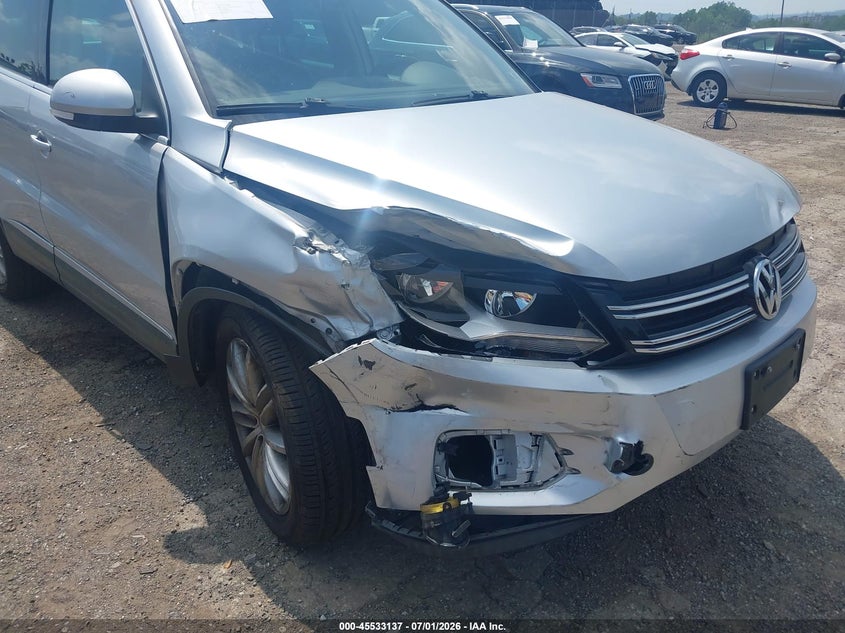 2014 Volkswagen Tiguan VIN WVGBV3AX0EW573763 IAAI salvage auction — RIGHT FRONT, Salvage Title, sold $725 on 2026-08-19 (photo 6)