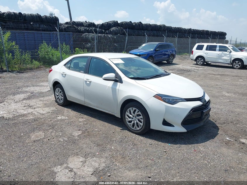 2018 Toyota Corolla VIN 5YFBURHE0JP835931 IAAI salvage auction — LEFT SIDE, Salvage Title, sold $2,700 on 2026-08-01 (photo 1)