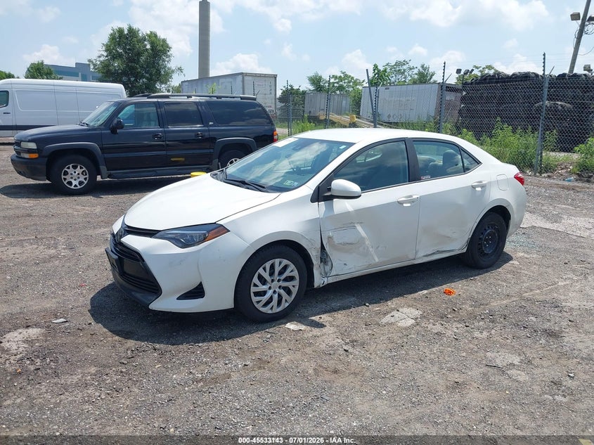 2018 Toyota Corolla VIN 5YFBURHE0JP835931 IAAI salvage auction — LEFT SIDE, Salvage Title, sold $2,700 on 2026-08-01 (photo 2)