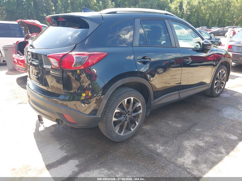 2016 Mazda Cx-5 VIN JM3KE4DYXG0810626 IAAI salvage auction — REAR END, Salvage Title, sold $2,700 on 2026-07-31 (photo 4)