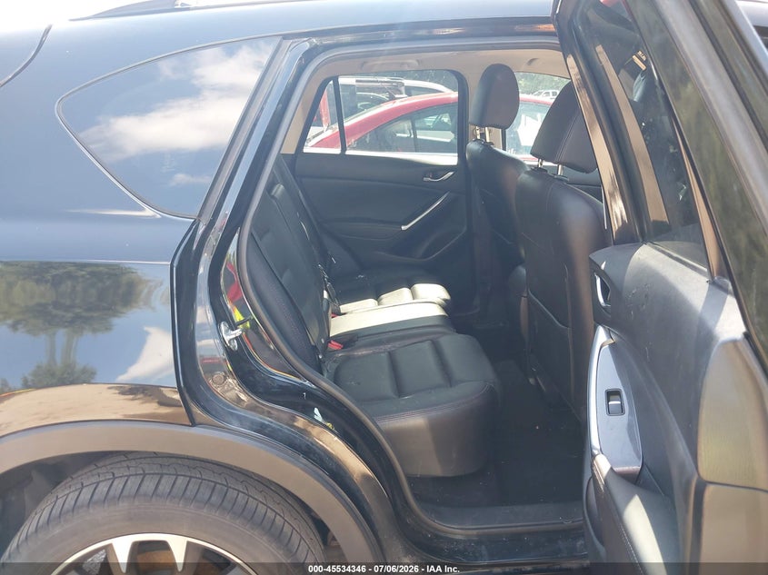 2016 Mazda Cx-5 VIN JM3KE4DYXG0810626 IAAI salvage auction — REAR END, Salvage Title, sold $2,700 on 2026-07-31 (photo 8)