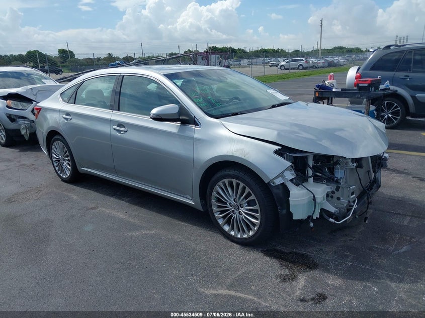 2016 Toyota Avalon VIN 4T1BK1EB2GU216076 — IAAI salvage auction photo