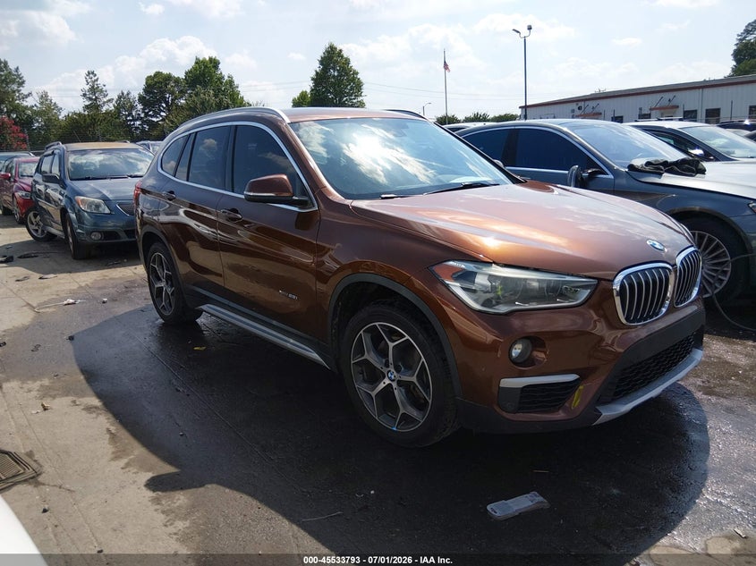 2017 BMW X1 VIN WBXHT3C33H5F72606 IAAI salvage auction — REAR END, Salvage (North Carolina), sold $3,100 on 2026-07-29 (photo 1)