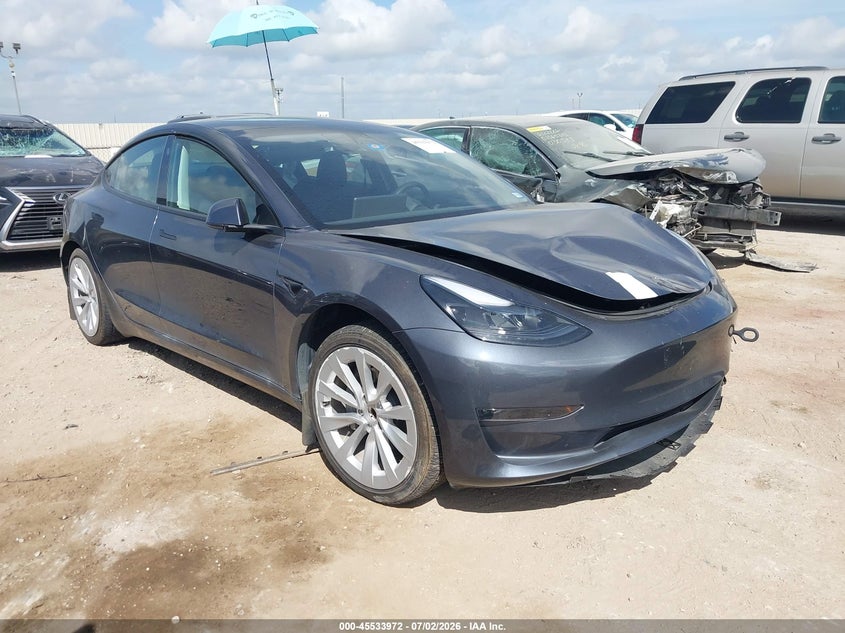 2023 Tesla Model 3 VIN 5YJ3E1EAXPF615947 IAAI salvage auction — SIDE, Original (Texas), sold $7,600 on 2026-07-29 (photo 1)