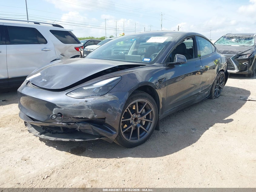2023 Tesla Model 3 VIN 5YJ3E1EAXPF615947 IAAI salvage auction — SIDE, Original (Texas), sold $7,600 on 2026-07-29 (photo 2)