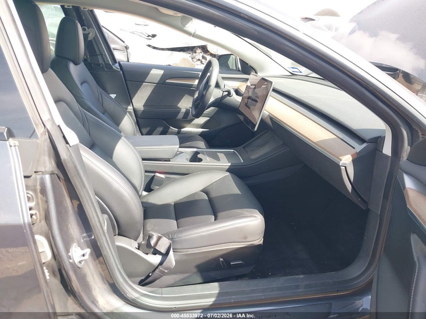 2023 Tesla Model 3 VIN 5YJ3E1EAXPF615947 IAAI salvage auction — SIDE, Original (Texas), sold $7,600 on 2026-07-29 (photo 5)