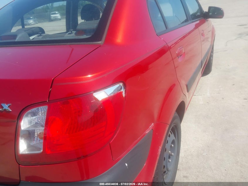 2009 Kia Rio VIN KNADE223096527128 IAAI salvage auction — RIGHT REAR, Repossessed (Missouri), sold $625 on 2026-07-14 (photo 6)