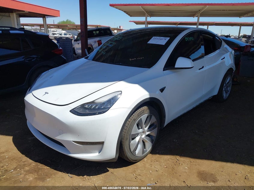2023 Tesla Model y VIN 7SAYGDEE2PA093190 IAAI salvage auction — REAR END, Salvage (Arizona), sold $13,000 on 2026-07-16 (photo 2)