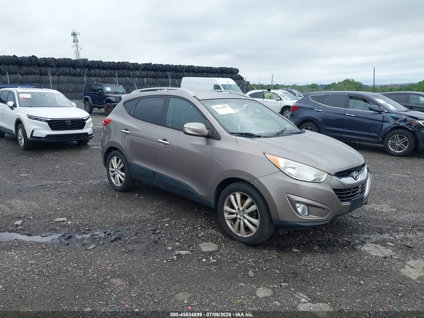 2012 Hyundai Tucson VIN KM8JUCAC8CU424893 IAAI salvage auction — SIDE, Salvage (Pennsylvania), sold $1,300 on 2026-07-17 (photo 1)