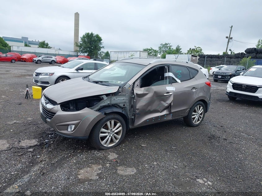 2012 Hyundai Tucson VIN KM8JUCAC8CU424893 IAAI salvage auction — SIDE, Salvage (Pennsylvania), sold $1,300 on 2026-07-17 (photo 2)