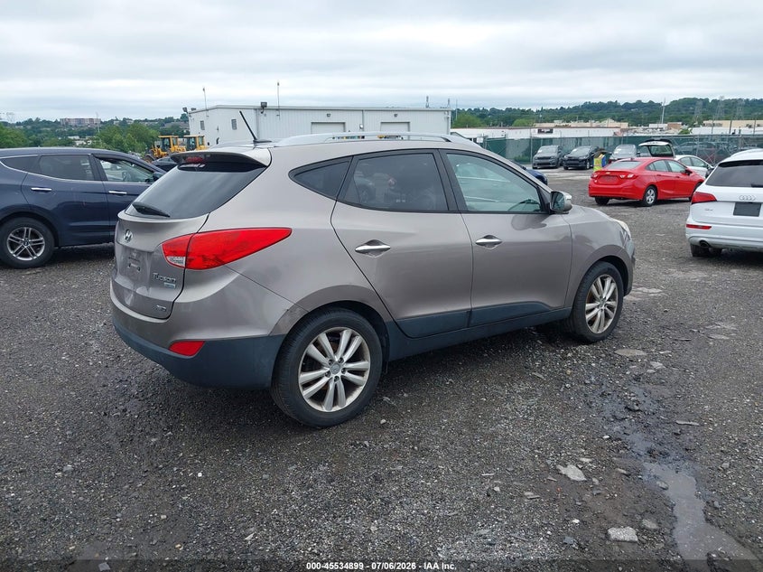 2012 Hyundai Tucson VIN KM8JUCAC8CU424893 IAAI salvage auction — SIDE, Salvage (Pennsylvania), sold $1,300 on 2026-07-17 (photo 4)