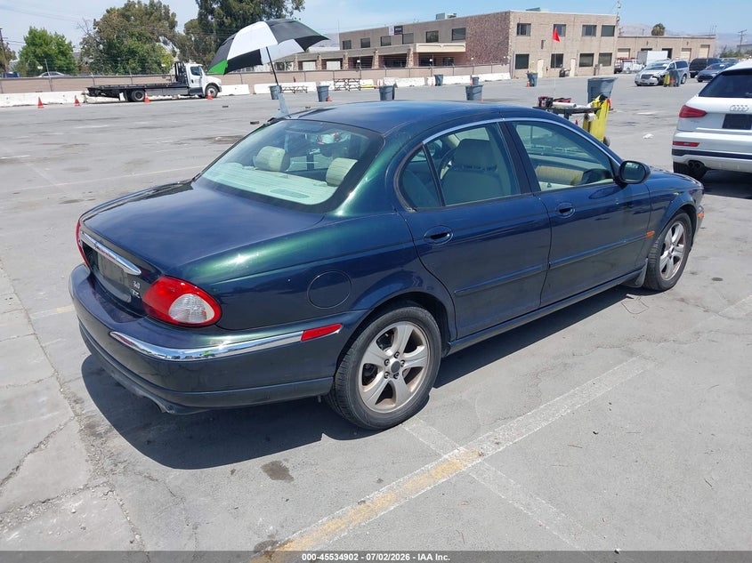 2002 Jaguar X type VIN SAJEA51C42WC28869 IAAI salvage auction — NORMAL WEAR, Clear - Dealer Only (California), sold $400 on 2026-07-13 (photo 4)
