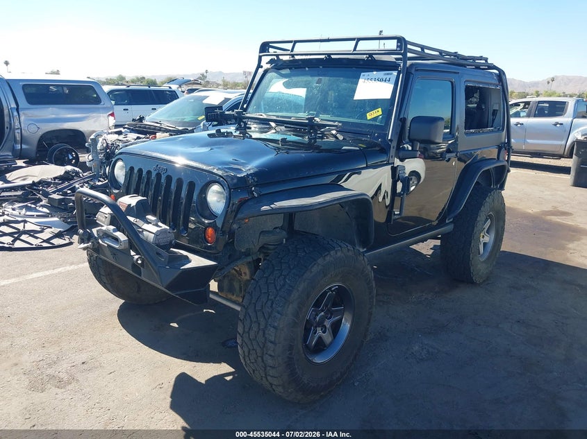 2013 Jeep Wrangler / VIN 1C4HJWCG1DL672536 IAAI salvage auction — ROLLOVER, Salvage Title, sold $4,700 on 2026-08-03 (photo 2)
