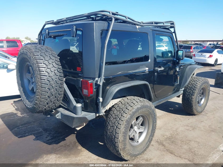 2013 Jeep Wrangler / VIN 1C4HJWCG1DL672536 IAAI salvage auction — ROLLOVER, Salvage Title, sold $4,700 on 2026-08-03 (photo 4)