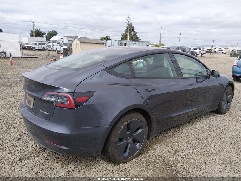 2022 Tesla Model 3 VIN 5YJ3E1EB2NF174420 IAAI salvage auction — UNDERCARRIAGE, Salvage Title, sold $10,500 on 2026-09-02 (photo 4)