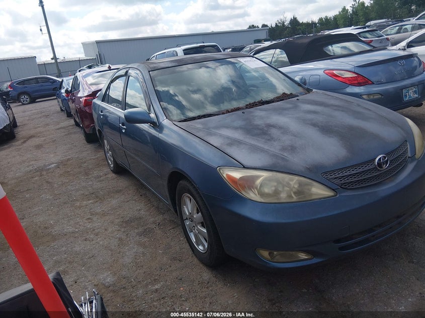 2003 Toyota Camry VIN JTDBE30KX30165314 IAAI salvage auction — NORMAL WEAR, Clear (Oklahoma), sold $100 on 2026-07-22 (photo 1)