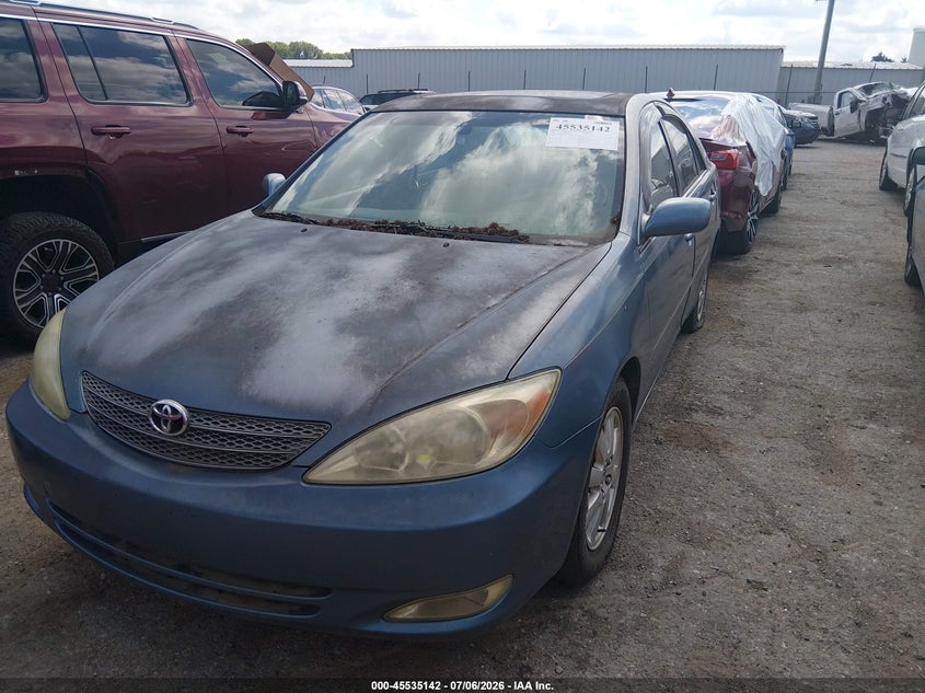 2003 Toyota Camry VIN JTDBE30KX30165314 IAAI salvage auction — NORMAL WEAR, Clear (Oklahoma), sold $100 on 2026-07-22 (photo 2)
