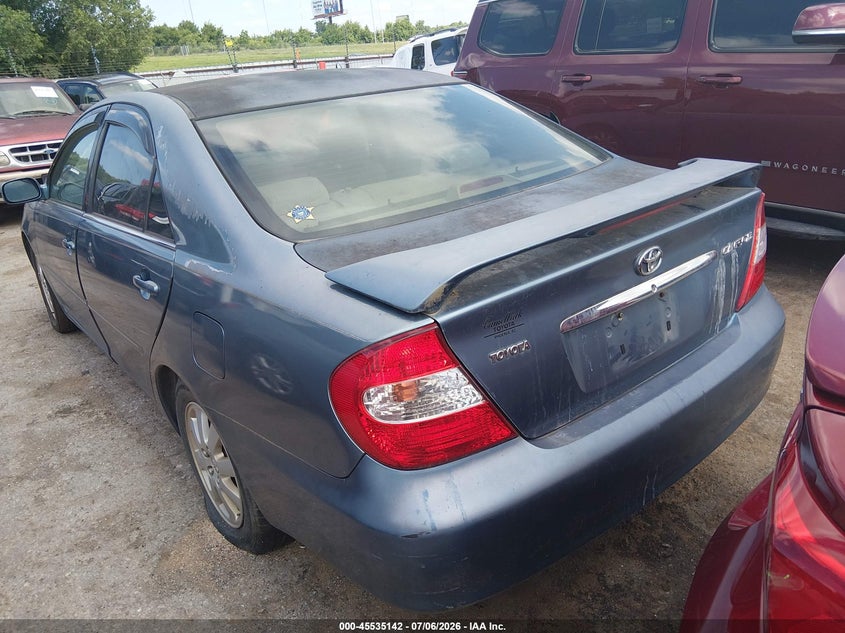 2003 Toyota Camry VIN JTDBE30KX30165314 IAAI salvage auction — NORMAL WEAR, Clear (Oklahoma), sold $100 on 2026-07-22 (photo 3)