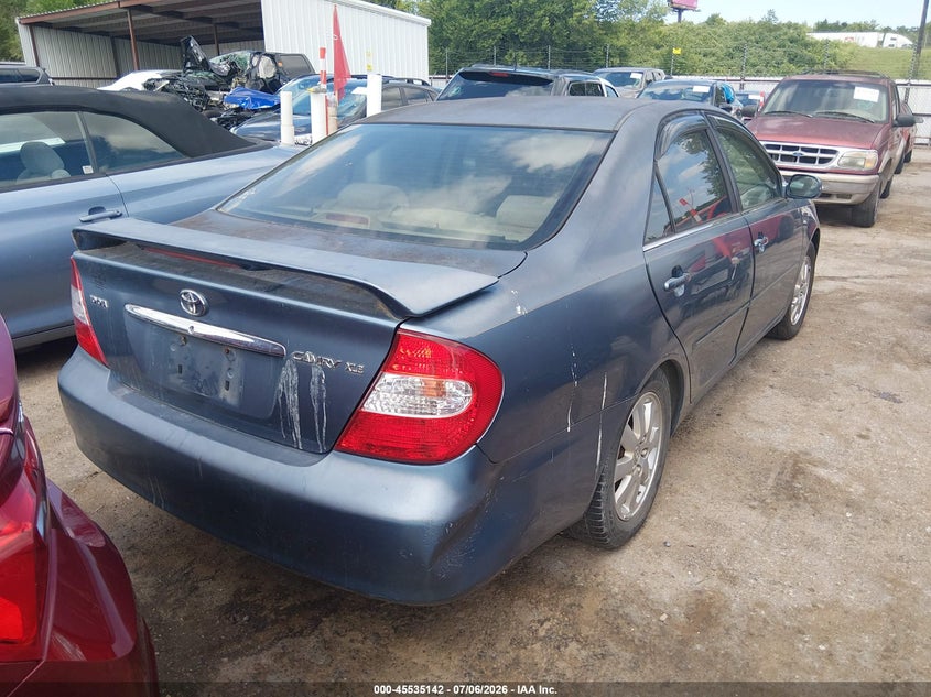 2003 Toyota Camry VIN JTDBE30KX30165314 IAAI salvage auction — NORMAL WEAR, Clear (Oklahoma), sold $100 on 2026-07-22 (photo 4)