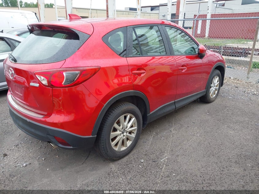 2014 Mazda Cx-5 VIN JM3KE4BE8E0385963 IAAI salvage auction — NORMAL WEAR, Clear (New York), sold $1,350 on 2026-07-29 (photo 4)
