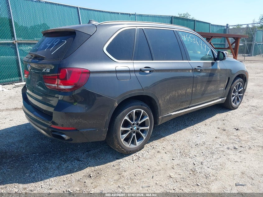 2014 BMW X5 VIN 5UXKR6C57E0C02903 IAAI salvage auction — NORMAL WEAR, Clear (Indiana), sold $25 on 2026-07-14 (photo 4)