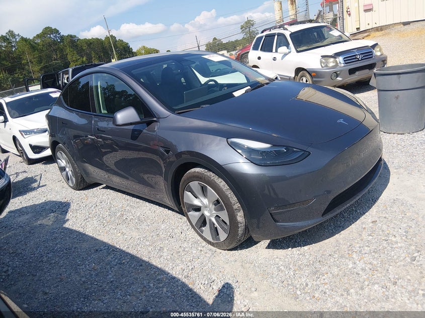 2023 Tesla Model y VIN 7SAYGAEE9PF788283 — IAAI salvage auction photo