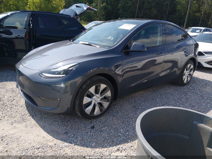 2023 Tesla Model y VIN 7SAYGAEE9PF788283 IAAI salvage auction — WATER/FLOOD, Flood (Mississippi), sold $14,500 on 2026-08-27 (photo 2)