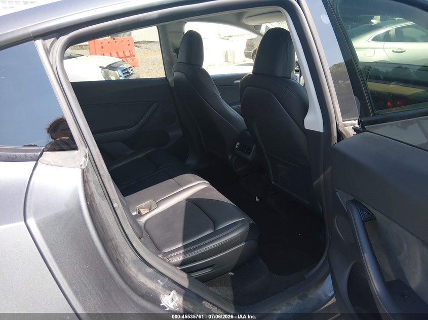 2023 Tesla Model y VIN 7SAYGAEE9PF788283 IAAI salvage auction — WATER/FLOOD, Flood (Mississippi), sold $14,500 on 2026-08-27 (photo 7)