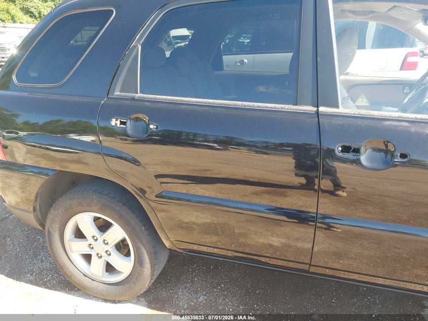 2010 Kia Sportage VIN KNDKG3A33A7720335 IAAI salvage auction — NORMAL WEAR, Original (Texas), sold $25 on 2026-07-23 (photo 6)