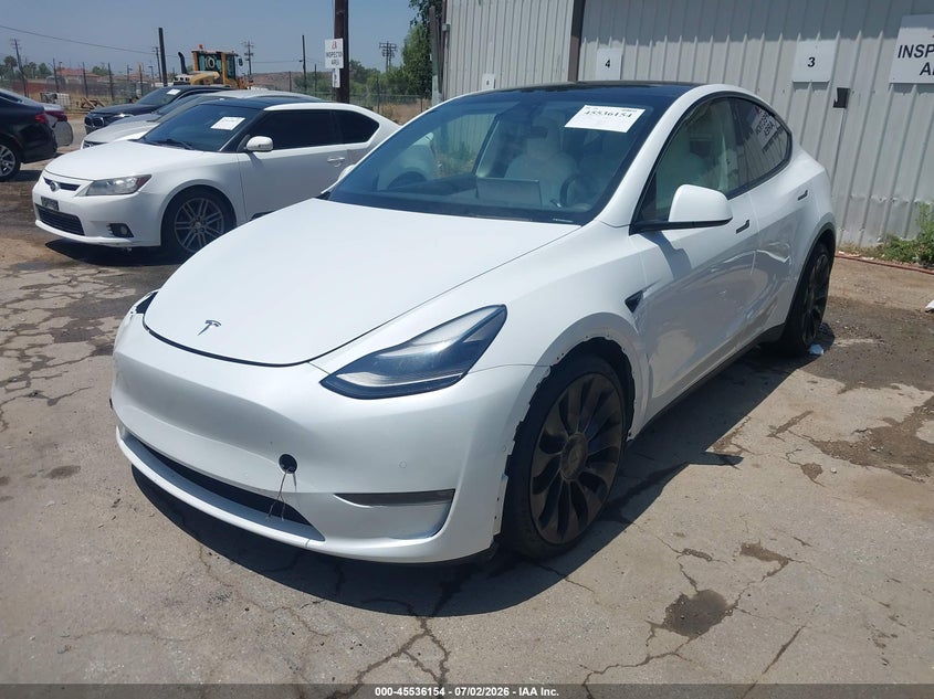 2022 Tesla Model y VIN 7SAYGDEF4NF490019 IAAI salvage auction — RIGHT FRONT, Clear (California), sold $17,950 on 2026-07-14 (photo 2)
