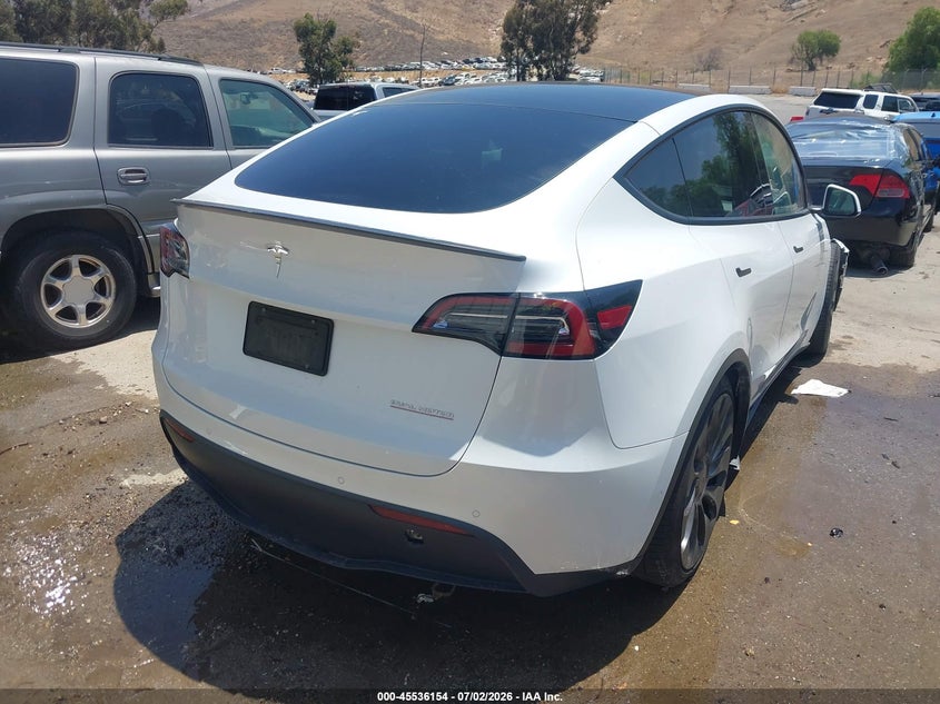 2022 Tesla Model y VIN 7SAYGDEF4NF490019 IAAI salvage auction — RIGHT FRONT, Clear (California), sold $17,950 on 2026-07-14 (photo 4)