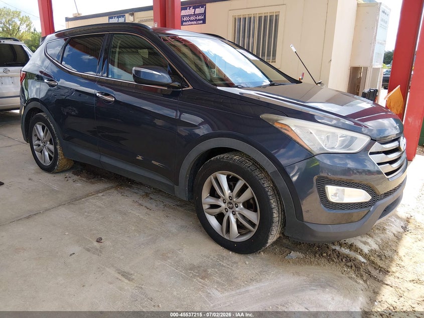 2014 Hyundai Santa fe VIN 5XYZU3LA6EG212422 IAAI salvage auction — NORMAL WEAR, Clear (Florida), sold $2,000 on 2026-07-14 (photo 1)