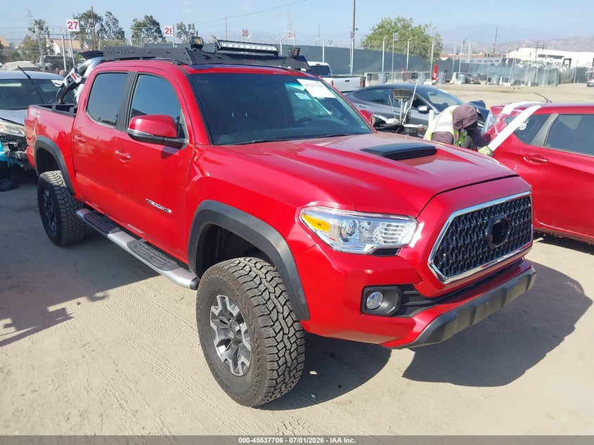 2019 Toyota Tacoma VIN 5TFAZ5CN6KX074869 IAAI salvage auction — FRONT END, Salvage (Nevada), sold $10,100 on 2026-07-15 (photo 1)