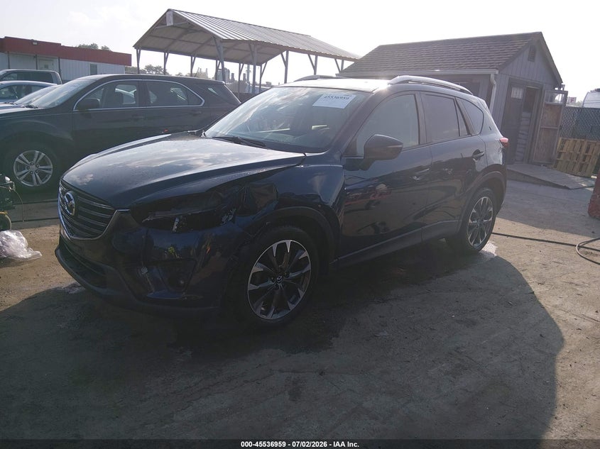 2016 Mazda Cx-5 VIN JM3KE4DY9G0908692 IAAI salvage auction — LEFT SIDE, Salvage - 75% Or Less (Maryland), sold $3,850 on 2026-07-29 (photo 2)