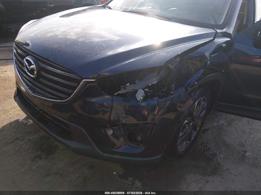 2016 Mazda Cx-5 VIN JM3KE4DY9G0908692 IAAI salvage auction — LEFT SIDE, Salvage - 75% Or Less (Maryland), sold $3,850 on 2026-07-29 (photo 6)