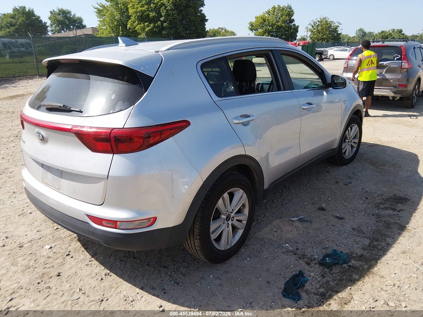 2019 Kia Sportage VIN KNDPMCAC8K7501354 IAAI salvage auction — THEFT, Salvage Title, sold $2,900 on 2026-08-02 (photo 4)